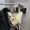 Bolsa de Mão Pequena com Padrão de Lichia Transfronteiriça Nova Tendência Casual de Balde Versátil para Ombro Transversal Primavera 2026