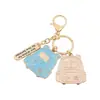 Llaveros personalizados más vendidos transfronterizos, dijes para mochilas, colgantes de aleación para la temporada de graduación, accesorios con temática de campus para las mochilas de los estudiantes