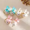Brincos de Tarraxa Flor de Agulha Europeus e Americanos Transfronteiriços com Pérola Doce Fresco Moderno Brincos Leve Luxo Toque de Alta Qualidade Ornamentos de Orelha para Mulheres Atacado