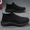 Nuevos zapatos casuales para hombre, deportivos de malla, informales, para correr, de malla tejida, para el trabajo, calcetines negros ligeros, zapatos de moda.