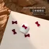 Accesorios Populares para Uñas con Forma de Moño Resina Borgoña Cinta Flujo Mini Pajarita Estéreo Accesorios para Uñas Venta al por Mayor