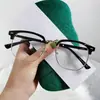 Nuevos lentes para hombre estilo retro, modernos y elegantes, diseñados para hombres conocedores de la tecnología, con lentes transparentes, bloqueo de luz azul y un refinado diseño de media montura