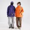 Nueva chaqueta exterior estilo montaña tres en uno 2026 para hombres y mujeres, conjunto de dos piezas, ropa de montañismo a prueba de viento e impermeable