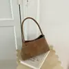Bolso Femenino para Axila 2026 Nuevo de Moda Otoño Vintage Nicho Patrón Tejido Bolso de Hombro para el Trabajo y los Viajes Bolso Cubo