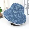 Sombrero de pescador de mezclilla bordado floral para mujer de primavera y verano, lavado, protección solar, estilo callejero casual, con bordes deshilachados
