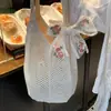 Bolso de mano tejido estilo casual para vacaciones para mujer, versión coreana, bolso tote estilo relajado para el día a día, bolso de hombro hueco para la playa
