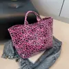 Bolsa de mano tipo tote de gelatina a rayas de colores en PVC para mujer, procedente del fabricante en Baigou, disponible para entrega transfronteriza, personalizable y se puede imprimir con un logotipo