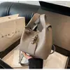 Bolsa Texturizada Retrô Transfronteiriça Feminina 2024 Outono e Inverno Nova Moda Simples Balde Bolsa All-match Crossbody Bag