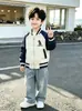Chaqueta de Béisbol de Moda para Niños 2026 Nuevo Otoño Estilo Coreano Infantil Tendencia Dinosaurio Corta Bloque de Color Chaqueta Top