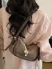 Bolsa de Tofu Trançada Fashion Tendência para Mulheres Verão 2026 Novo Estilo Ins Simples Casual Bolsa Saco Bolsa de Ombro para o Dia a Dia