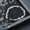 Pulsera para hombre de estilo europeo y americano con cruz incrustada de diamantes, acero de titanio, no se decolora, joyería versátil de alta gama, accesorio de nicho moderno para mujer