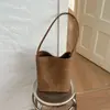 Bolso de axila texturizado retro francés Shuai Mijia para mujer, nuevo bolso de hombro casual tejido elegante 2026