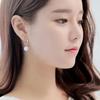 Moda japonesa y coreana dulce elegante inteligente simple fresca joyería para orejas flor de coche hebilla de oreja de ópalo femenina al por mayor
