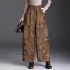 Pantalones de pierna curva estilo chino jacquard de moda para mujer 2026 Otoño/Invierno Nuevos de cintura alta, fluidos, cropped, elegantes, versátiles, casuales