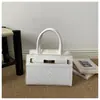Comercio exterior casual retro ropa de trabajo 2026 lujo ligero colgante de PU bolso simple chic bandolera cruzada para mujer