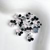 Venta al por mayor luminoso en vivo caliente negro rosa rosa joyería de uñas simulación flor paquete de material para uñas