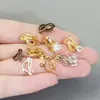 Accesorios para pendientes hechos a mano DIY al por mayor sin agujero en la oreja clip triangular indoloro retención de color convertidor de clip para oreja de oro de 18K