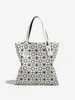 Bolso de mujer nuevo estilo japonés y coreano para primavera/verano, moderno, simple, deslumbrante, de alta gama, patrón de rombos geométricos, versátil, bolso de hombro de gran capacidad