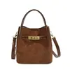 Bolso pequeño de mano con acabado mate texturizado para mujer, nuevo bolso tipo cubo retro otoño/invierno 2026, bolso de hombro/cruzado elegante y versátil