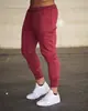 Amazon talla extra Comercio exterior para hombre casual color liso diseño de bolsa con cordón corte ajustado skinny pantalones venta al por mayor de fábrica