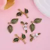 Colar com pingente de folha verde estilo floresta acessório DIY joia artesanal em liga com gota de óleo acessório corrente de celular chaveiro pingente