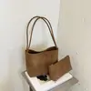 Bolso Retro Bajo el Brazo para Mujer 2026 Nuevo Otoño Gama Alta Nicho Textura Tejida Bolso de Hombro Único Bolso Cubo para Viajar al Trabajo