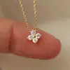 Plata S999, chapado en oro de 18 quilates, collar de trébol de cuatro hojas de la suerte, cadena para clavícula de mujer, minimalista y elegante, colgante versátil, moderno y chic