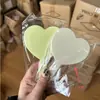 Espejo de maquillaje de mano espejo de mango de amor para niña espejo portátil salón de belleza de mano fábrica al por mayor imprimible