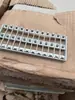 Adaptador de Tarjeta de Tira de Soporte de Brida de 12 núcleos 24 núcleos 36 núcleos Soporte de Plástico Adaptador de Fibra Óptica Tornillo de Rack Sin