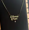 Collar Hueco de Acero Inoxidable con Doble Nombre Estilo Europeo y Americano para Mujer, Colgante de Acero de Titanio con Diamantes Blancos Diseño Personalizado DIY