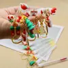 Novo Produto de Comércio Exterior com Boneca e Chaveiro, Chaveiro Pincel de Cílios de Natal, Pincel de Cílios Cartoon em Tubo de Ensaio de Natal
