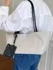 Yue Zi 2026 Verão Nova Moda Simples Grande Capacidade Tecido de Nylon Bolsa Versátil para o Dia a Dia Bolsa de Ombro Único Bolsa Tote
