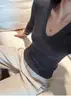 Camiseta base de punto simple y elegante estilo coreano con cuello en V para mujer, nueva de otoño e invierno 2026, top ajustado de manga larga