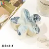 Nuevo Clip de Huevo con Flores Qiyue Moda Impresión UV Pasador de Orquídea Florale Clip de Tiburón Creativo Europeo y Americano