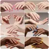 2025 Nueva Caja de Uñas Portátil para Manicura Pieza de Armadura Color Puro Alto Brillo Cuadrado Corto Uña Pequeña Adulto Pieza de Uña Tipo Presión