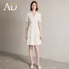 Anuncio Vestido de Verano para Mujer 2025 Nuevo Metal Doble Botonadura Beige Mangas Cortas Traje Falda Falda Plisada de Gama Alta