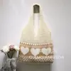 2025 Bolsas Transfronterizas Nuevas Bolsas de Mano Japonesas y Coreanas Bolsas de Color Sólido Bolsas Tejidas con Aguja Bolsas Caladas Bolsas Tejidas a Mano Bolsas para Mujer de Moda