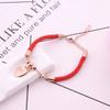 Nuevo brazalete de cuerda roja de oro rosa 18K con bola de transferencia Totoro para hombres y mujeres, parejas, versión coreana de joyería simple, cuerda para la mano al por mayor