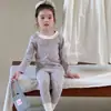 Nuevo conjunto de ropa de estar para niños de algodón puro, sin costuras y con Lycra, unisex, grado A, con diseños de dibujos animados, adecuado para usar en otoño como conjunto de camiseta de manga larga y pantalones o pijama