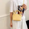 Comercio Exterior Estilo Coreano Lujo Ligero Bolso de Cubo Portátil para Mujer Bolso de Hombro Simple Elegante Nuevo Verano 2026 Bolso Cruzado para el Trabajo