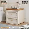 Mesa de Cabeceira Usada para Quarto de Casa 2026 Novo Modelo Creme Luxo Leve High-End Madeira Maciça Pequeno Armário de Armazenamento de Cabeceira