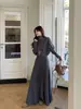 Conjunto de Duas Peças Tricô Gola Alta Manga Longa Estilo Francês Feminino Outono Inverno Estilo Menina Rica Saia Midi