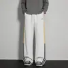 Calça de moletom listrada estilo americano, nova coleção de outono, corte solto, com caimento fluido, bordado color-blocking, versátil para esportes e uso casual