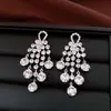 Pendientes de Plata Estilo Europeo y Americano con Borlas Redondas Tachonadas de Diamantes, Pendientes de Lujo Ligero de Gama Alta, Pendientes Versátiles Exagerados y Exquisitos de Nicho para Mujer