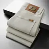 Roupas Masculinas Populares / Novo Outono e Inverno Luxo Negócios Estilo Europeu Slim Fit Stretch Calça Jeans Reta Tendência Marca Calças Grossas