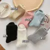 Calcetines de felpa suaves y esponjosos de color liso para otoño e invierno, cálidos para mujer, con forro polar añadido y rayas verticales engrosadas, calcetines de media pantorrilla, estilo moderno, calcetines holgados