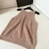 "Dinheiro velho solto" Colete de crochê resistente Versátil e emagrecedor + Cintura de Tencel Senso de Design Saia Midi