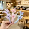 Faixa de cabelo infantil fofa desenho animado Sanrio urso morango acessórios de cabelo estilo coreano nova faixa de cabelo para meninas atacado loja de dois reais