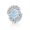 Anillo de Flor de Hielo con Gema de Color Brillante de Corte Huevo de Paloma Oversize de Venta Caliente Transfronteriza para Mujer Moda Europea y Americana Joyería de Diamante de Alto Carbono Brillante