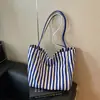 Bolsa tote listrada transfronteiriça, bolsa de ombro de grande capacidade para mulheres, bolsa simples e versátil para o dia a dia, nova coleção de outono, bolsa casual estilo coreano
